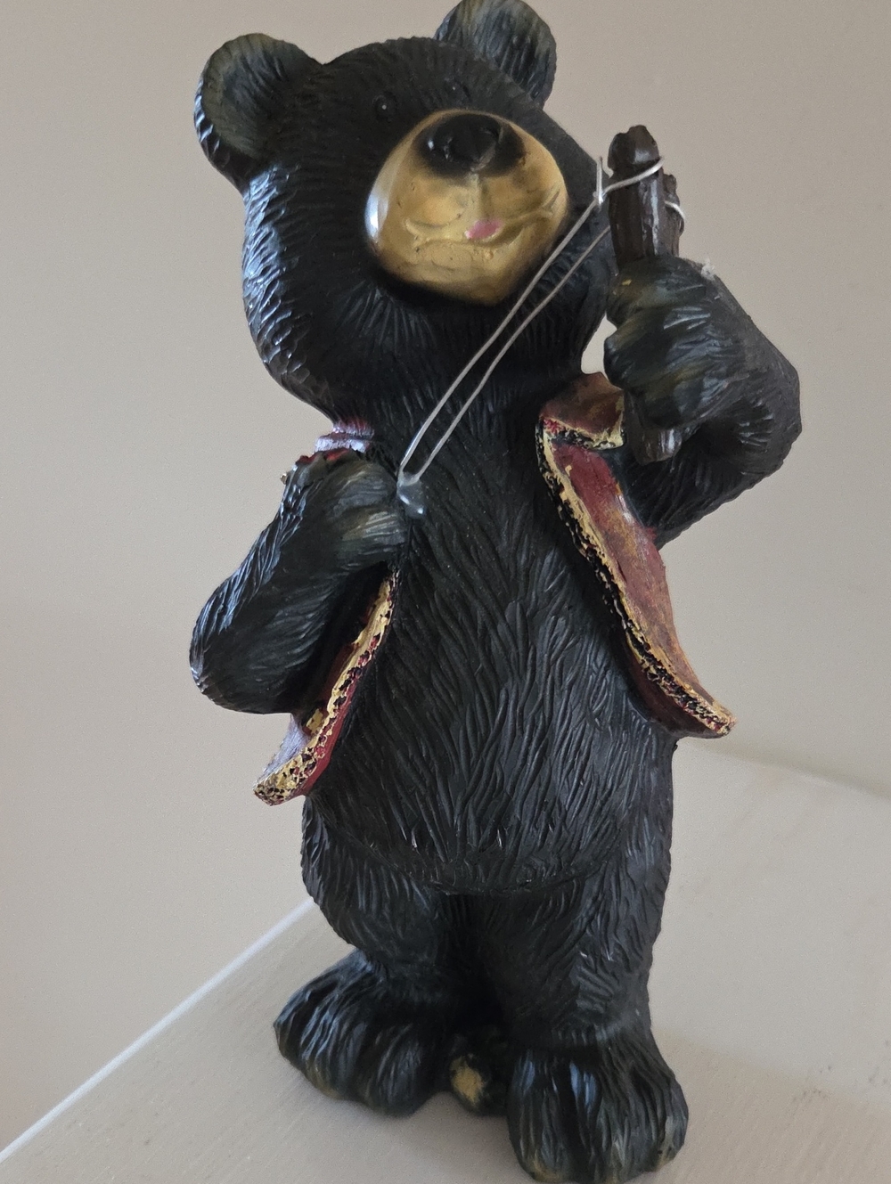Outdoor Black Bear Figurine with Red Trim Vest